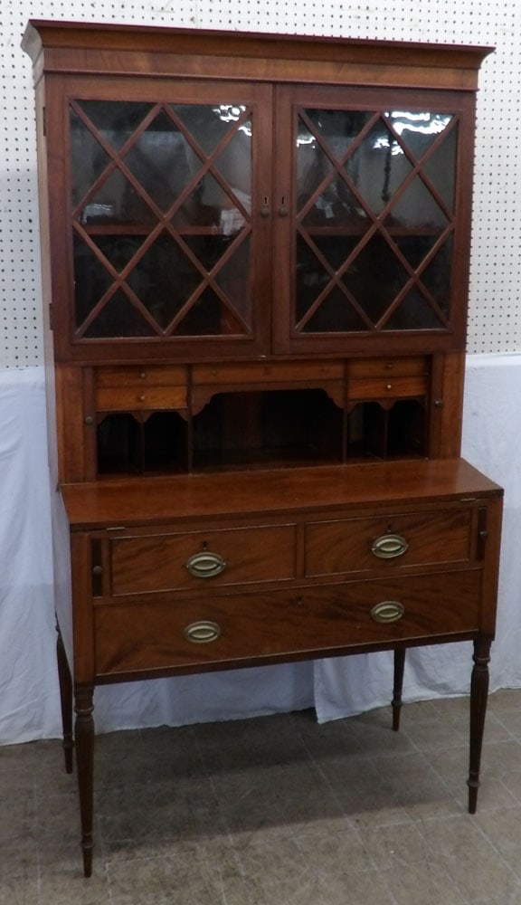 19th century mahogany tambor door secretary: 19th century mahogany tambor door secretary. 74 1/2" H 40" W 20" D ALL DESCRIPTIONS AND ANY CONDITION STATEMENT GIVEN BY LANGSTON AUCTION GALLERY ARE STRICTLY OPINIONS AND LANGSTON'S SHALL HAVE NO RES