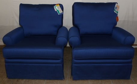 pair of modern upholstered swivel club chairs by capris furniture