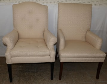 pair of modern upholstered arm chairs