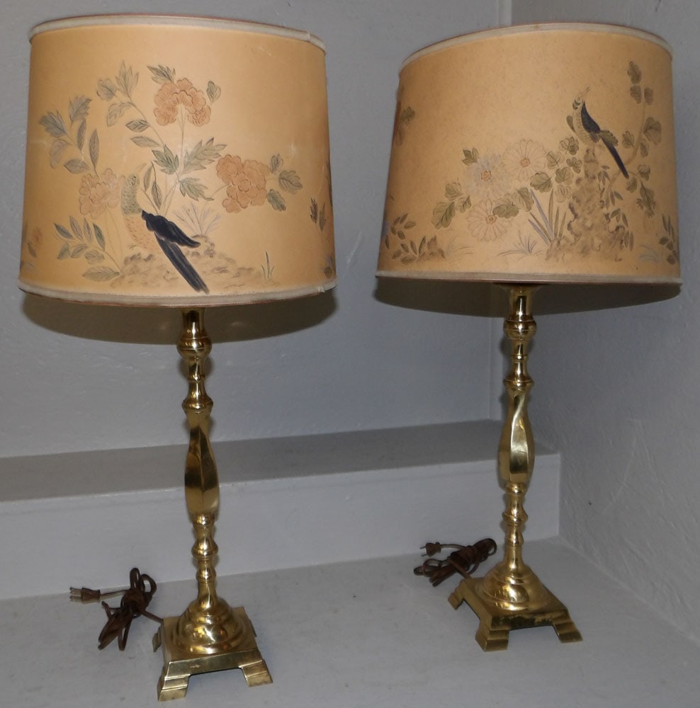 pair of brass candlestick lamps: pair of brass candlestick lamps. 28 1/4" H 14" Dia. ALL DESCRIPTIONS AND ANY CONDITION STATEMENT GIVEN BY LANGSTON AUCTION GALLERY ARE STRICTLY OPINIONS AND LANGSTON'S SHALL HAVE NO RESPONSIBILITY FOR