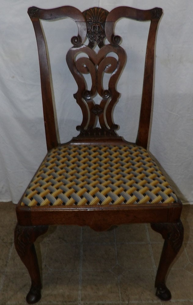18th century carved mahogany side chair with hoof feet: 18th century carved mahogany side chair with hoof feet. 38" H 22" W 18" D ALL DESCRIPTIONS AND ANY CONDITION STATEMENT GIVEN BY LANGSTON AUCTION GALLERY ARE STRICTLY OPINIONS AND LANGSTON'S SHALL HAVE