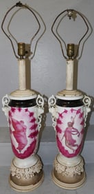 pair of hand painted porcelain urn lamps with restoration