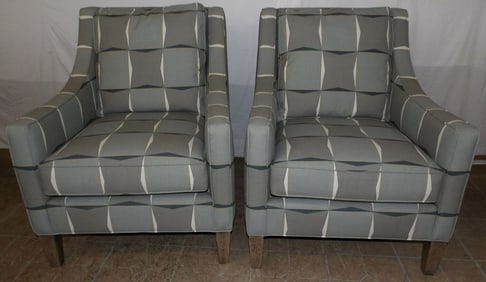 pair of modern upholstered arm chairs by Wesley Paul incorporated