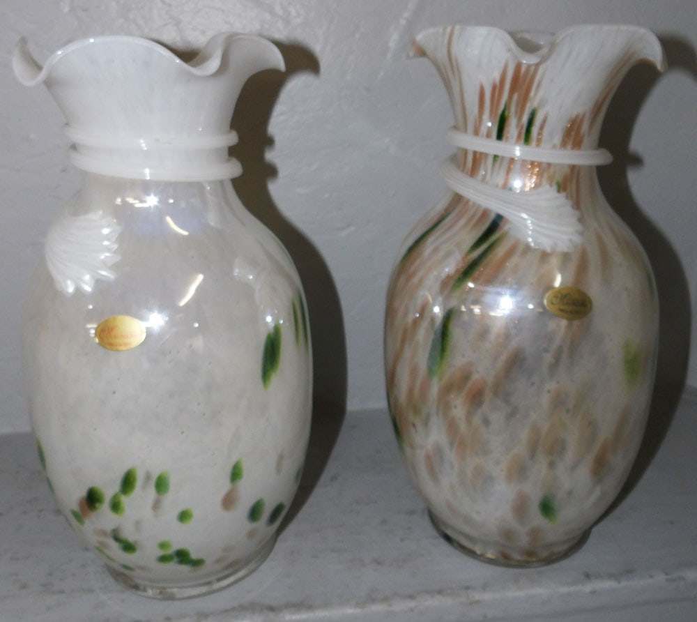 pair of Murano art glass vases: pair of Murano art glass vases . 13"H 6"Dia. ALL DESCRIPTIONS AND ANY CONDITION STATEMENT GIVEN BY LANGSTON AUCTION GALLERY ARE STRICTLY OPINIONS AND LANGSTON'S SHALL HAVE NO RESPONSIBILITY FOR ERRORS