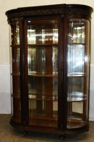 Antique Oak Bow Front China Cabinet with Mirror Back