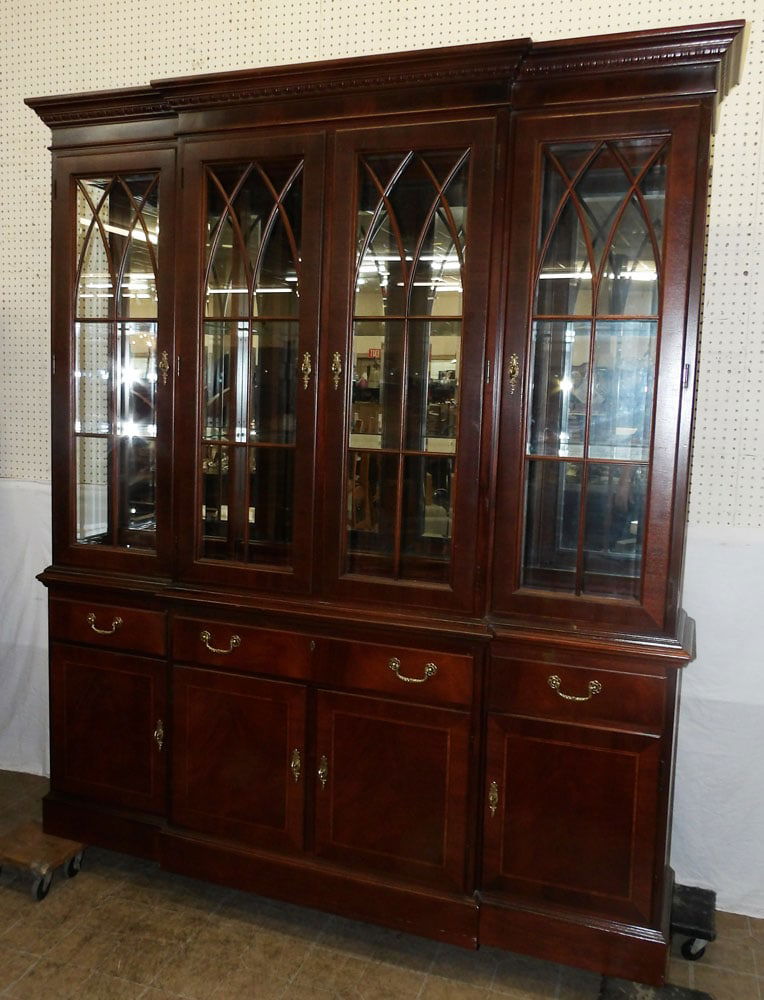 Mahogany Two Piece Mirror Back Glass Door Lighted Breakfront with Silver Drawer by Ethan Allen: Mahogany Two Piece Mirror Back Glass Door Lighted Breakfront with Silver Drawer by Ethan Allen. 82 3/4" H 70 1/4" W 16" D ALL DESCRIPTIONS AND ANY CONDITION STATEMENT GIVEN BY LANGSTON AUCTION GALLERY