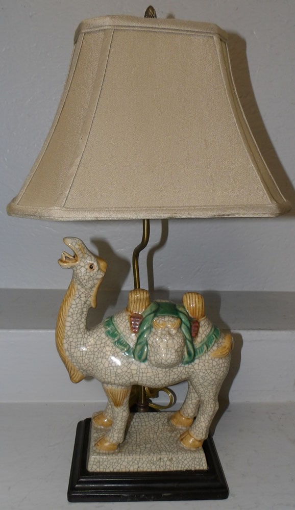 Painted Crackleware Camel Form Figure Lamp: Painted Crackleware Camel Form Figure Lamp. 24" H 15" W 9 1/4" D ALL DESCRIPTIONS AND ANY CONDITION STATEMENT GIVEN BY LANGSTON AUCTION GALLERY ARE STRICTLY OPINIONS AND LANGSTON'S SHALL HAVE NO RESPO