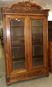 Antique Carved Italian Walnut Glass Door Bookcase with One Drawer Base