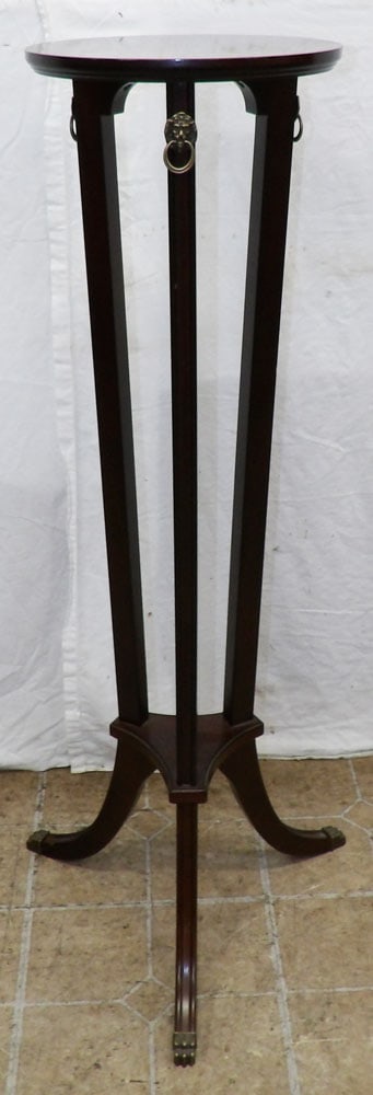 Mahogany Plant Stand by Bombay: Mahogany Plant Stand by Bombay . 40 1/2" H 11 1/4" Dia. ALL DESCRIPTIONS AND ANY CONDITION STATEMENT GIVEN BY LANGSTON AUCTION GALLERY ARE STRICTLY OPINIONS AND LANGSTON'S SHALL HAVE NO RESPONSIBILITY