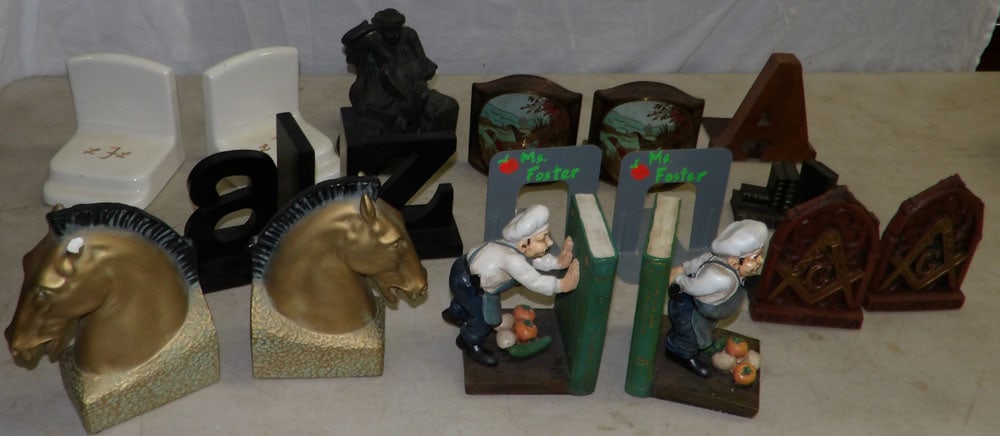 Lot of Porcelain, Wood, & Metal Bookends: Lot of Porcelain, Wood, & Metal Bookends. Up to 7" H 4" W 3" D ALL DESCRIPTIONS AND ANY CONDITION STATEMENT GIVEN BY LANGSTON AUCTION GALLERY ARE STRICTLY OPINIONS AND LANGSTON'S SHALL HAVE NO RESPONS