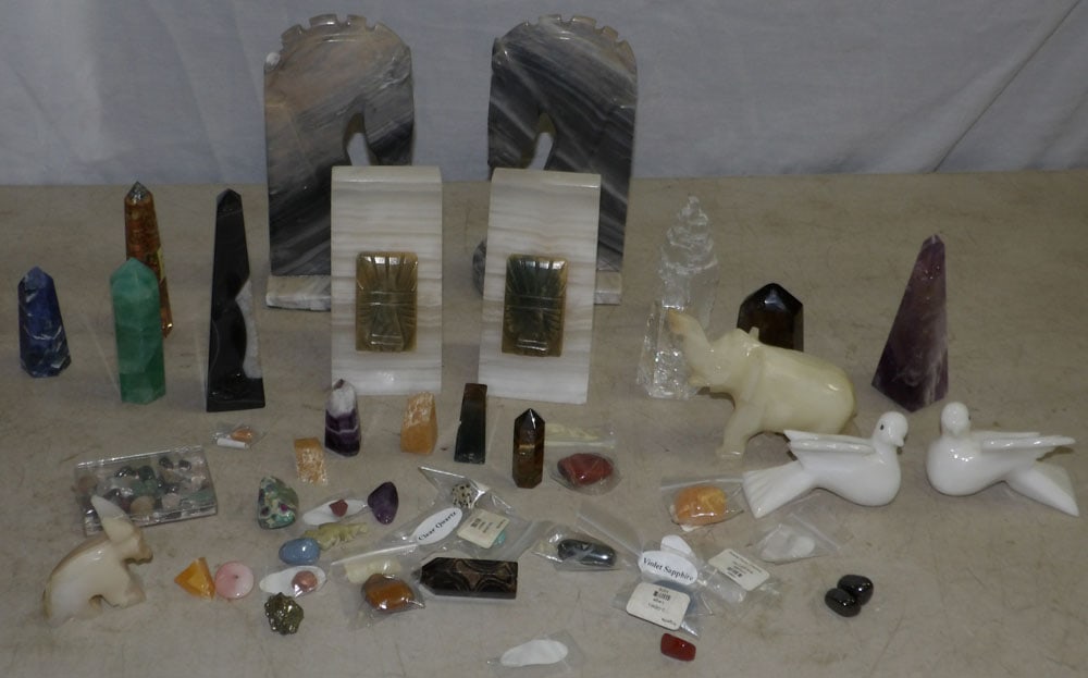 Lot of Marble Bookends, Figurines, & Stones: Lot of Marble Bookends, Figurines, & Stones . Up to 8 1/2" H 3" W 4 1/2" D ALL DESCRIPTIONS AND ANY CONDITION STATEMENT GIVEN BY LANGSTON AUCTION GALLERY ARE STRICTLY OPINIONS AND LANGSTON'S SHALL HAV