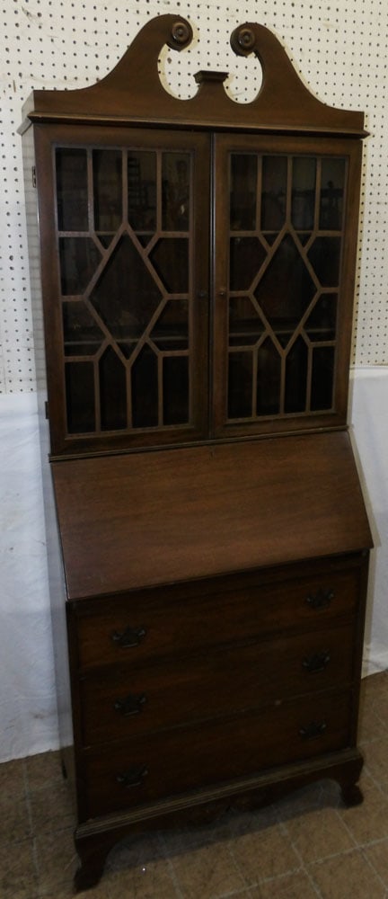 mahogany glass door secretary: mahogany glass door secretary . 77 1/2" H 29" W 15 1/2" D ALL DESCRIPTIONS AND ANY CONDITION STATEMENT GIVEN BY LANGSTON AUCTION GALLERY ARE STRICTLY OPINIONS AND LANGSTON'S SHALL HAVE NO RESPONSIBILI