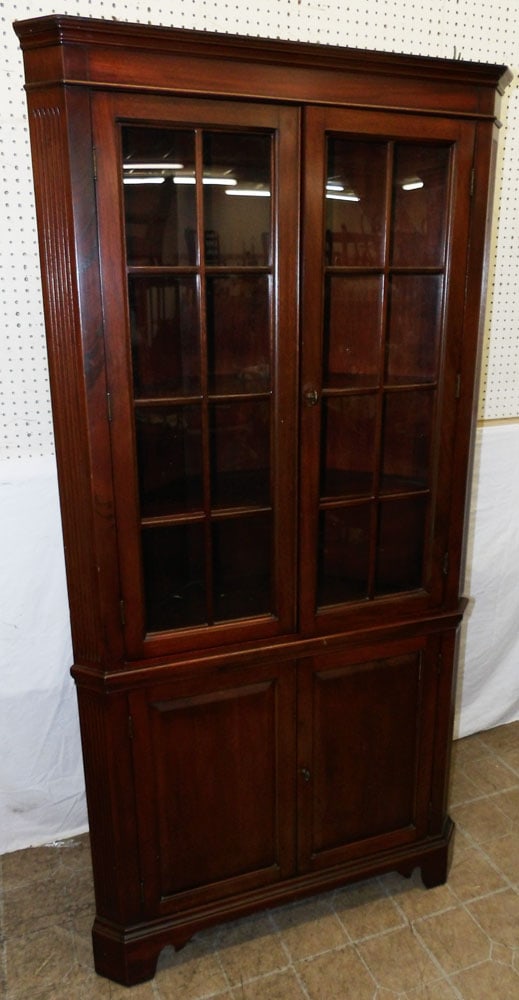 mahogany glass door corner cabinet: mahogany glass door corner cabinet . 74 1/4" H 37" W 15" D ALL DESCRIPTIONS AND ANY CONDITION STATEMENT GIVEN BY LANGSTON AUCTION GALLERY ARE STRICTLY OPINIONS AND LANGSTON'S SHALL HAVE NO RESPONSIBIL