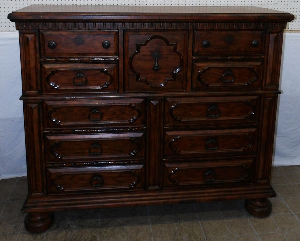 oak 11 drawer chest: oak 11 drawer chest . 50 1/4" H 60" W 20" D ALL DESCRIPTIONS AND ANY CONDITION STATEMENT GIVEN BY LANGSTON AUCTION GALLERY ARE STRICTLY OPINIONS AND LANGSTON'S SHALL HAVE NO RESPONSIBILITY FOR ERRORS