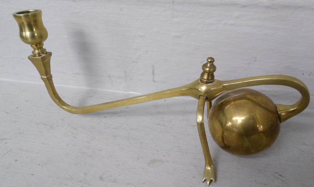 Brass Piano Cantilever Candlestick: Brass Piano Cantilever Candlestick . 5 1/2" H 11 1/4" W ALL DESCRIPTIONS AND ANY CONDITION STATEMENT GIVEN BY LANGSTON AUCTION GALLERY ARE STRICTLY OPINIONS AND LANGSTON'S SHALL HAVE NO RESPONSIBILITY