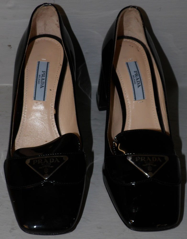 Pair of Black Pump Heels Marked Prada, (34 size): Pair of Black Pump Heels Marked Prada, (34 size). 8 1/4" L ALL DESCRIPTIONS AND ANY CONDITION STATEMENT GIVEN BY LANGSTON AUCTION GALLERY ARE STRICTLY OPINIONS AND LANGSTON'S SHALL HAVE NO RESPONSIBIL