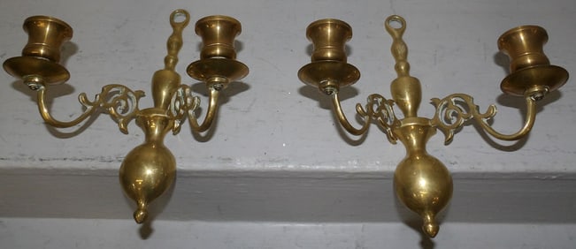 pair of brass sconces