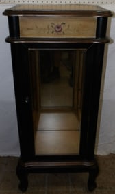 painted glass door and mirror back cabinet