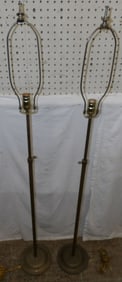 pair of brass floor lamps