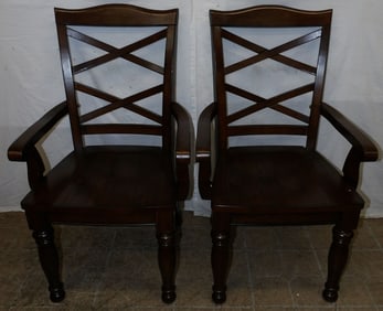 pair of mahogany arm chairs