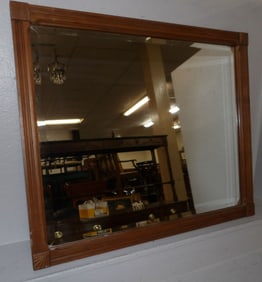walnut framed bevel edge mirror