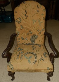 carved mahogany and crewel work upholstered arm chair