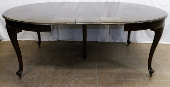 antique walnut dining table with three leaves
