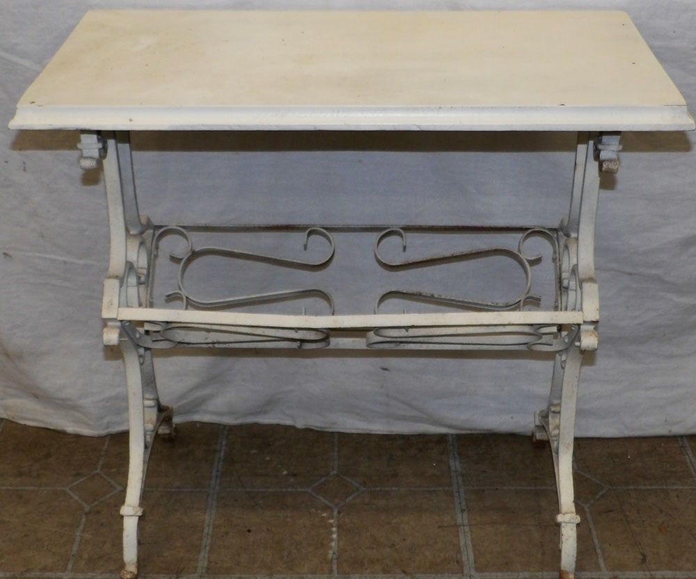 painted wood top and wrought iron base stand: painted wood top and wrought iron base stand . ALL DESCRIPTIONS AND ANY CONDITION STATEMENT GIVEN BY LANGSTON AUCTION GALLERY ARE STRICTLY OPINIONS AND LANGSTON'S SHALL HAVE NO RESPONSIBILITY FOR ERRO