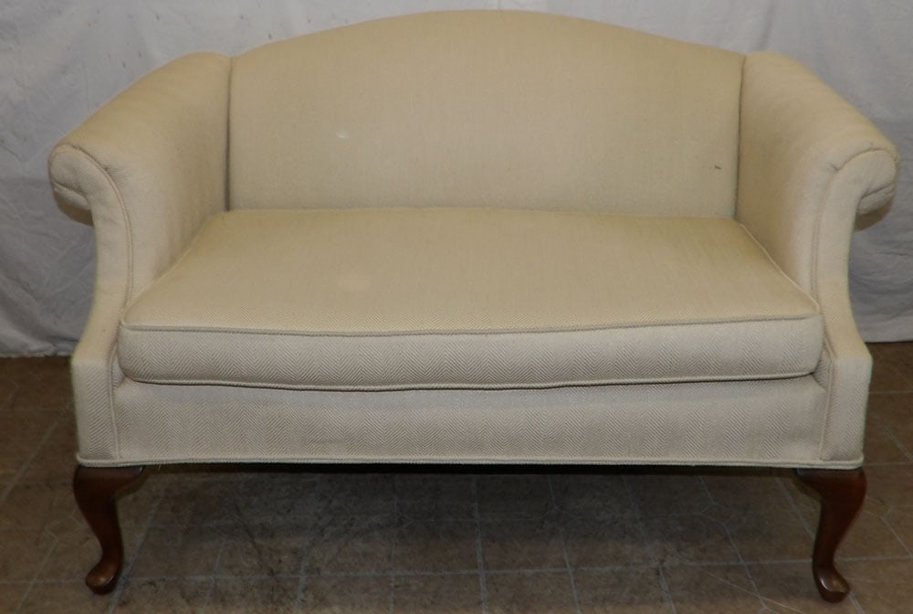 Cherry & Upholstered Queen Anne Style Loveseat: Cherry & Upholstered Queen Anne Style Loveseat. 35" H 54" W 34" D ALL DESCRIPTIONS AND ANY CONDITION STATEMENT GIVEN BY LANGSTON AUCTION GALLERY ARE STRICTLY OPINIONS AND LANGSTON'S SHALL HAVE NO RESP