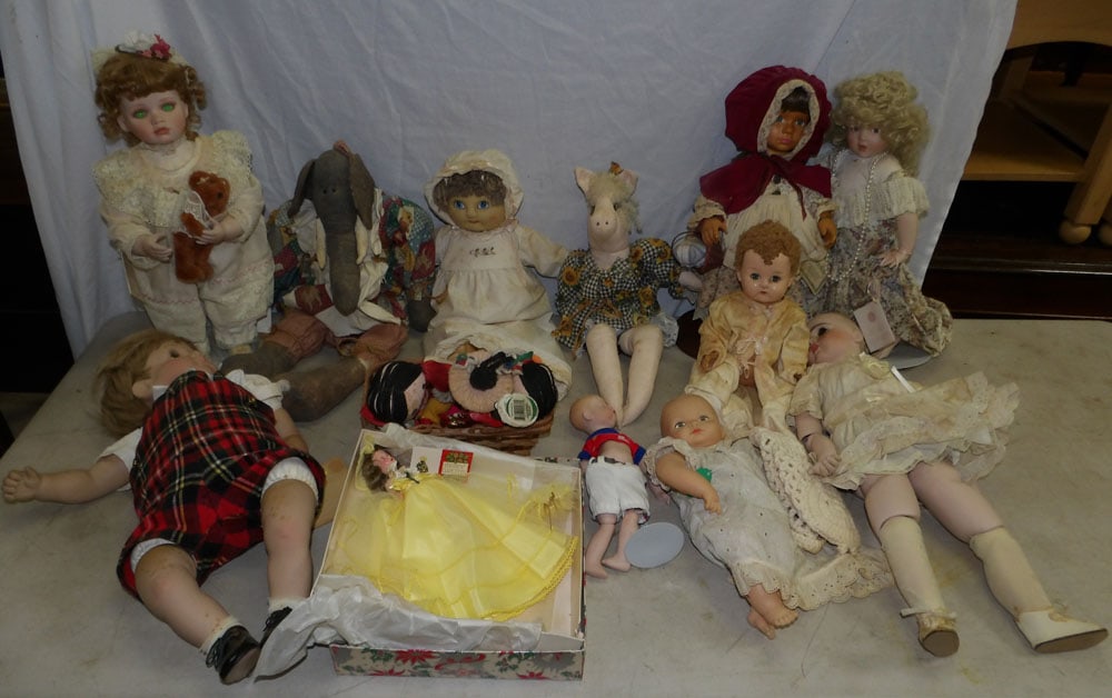 Lot of Dolls: Lot of Dolls . Up to 23" H 7" Dia. ALL DESCRIPTIONS AND ANY CONDITION STATEMENT GIVEN BY LANGSTON AUCTION GALLERY ARE STRICTLY OPINIONS AND LANGSTON'S SHALL HAVE NO RESPONSIBILITY FOR ERRORS OR OMISSI