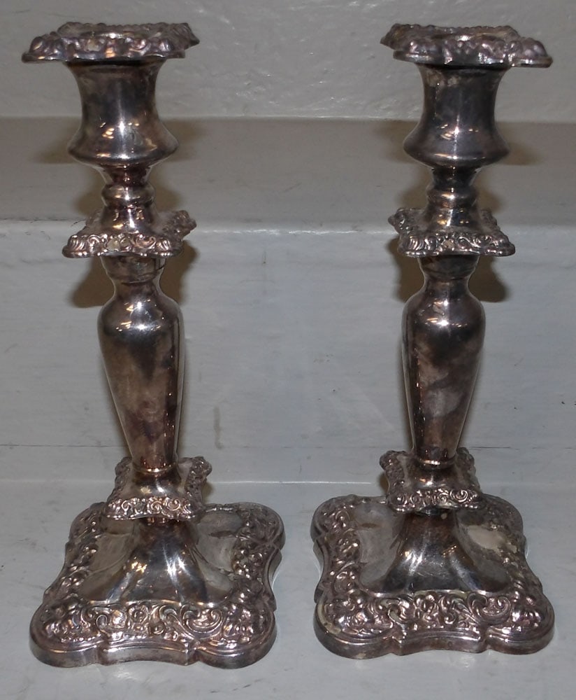 Pair of Silverplated Candlesticks: Pair of Silverplated Candlesticks . 10" H 4" Dia.
