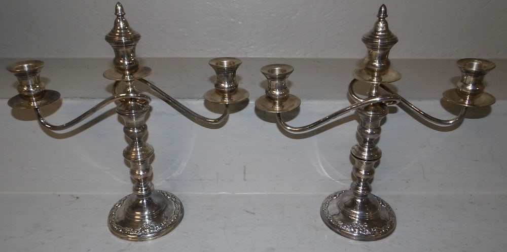 Pair of Sterling Weighted Three Light Candelabras: Pair of Sterling Weighted Three Light Candelabras . 11 1/4" H 10 3/4" W