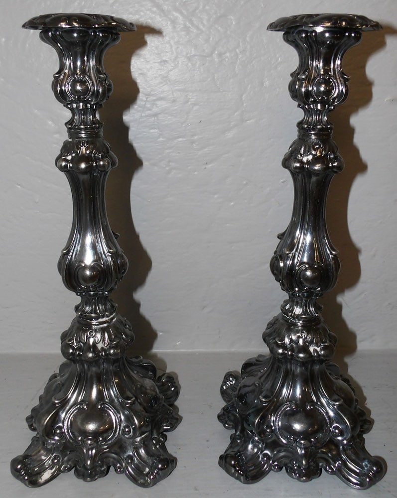 Pair of Silverplated Candlesticks by Rogers: Pair of Silverplated Candlesticks by Rogers . 12 3/4" H 5" Dia.