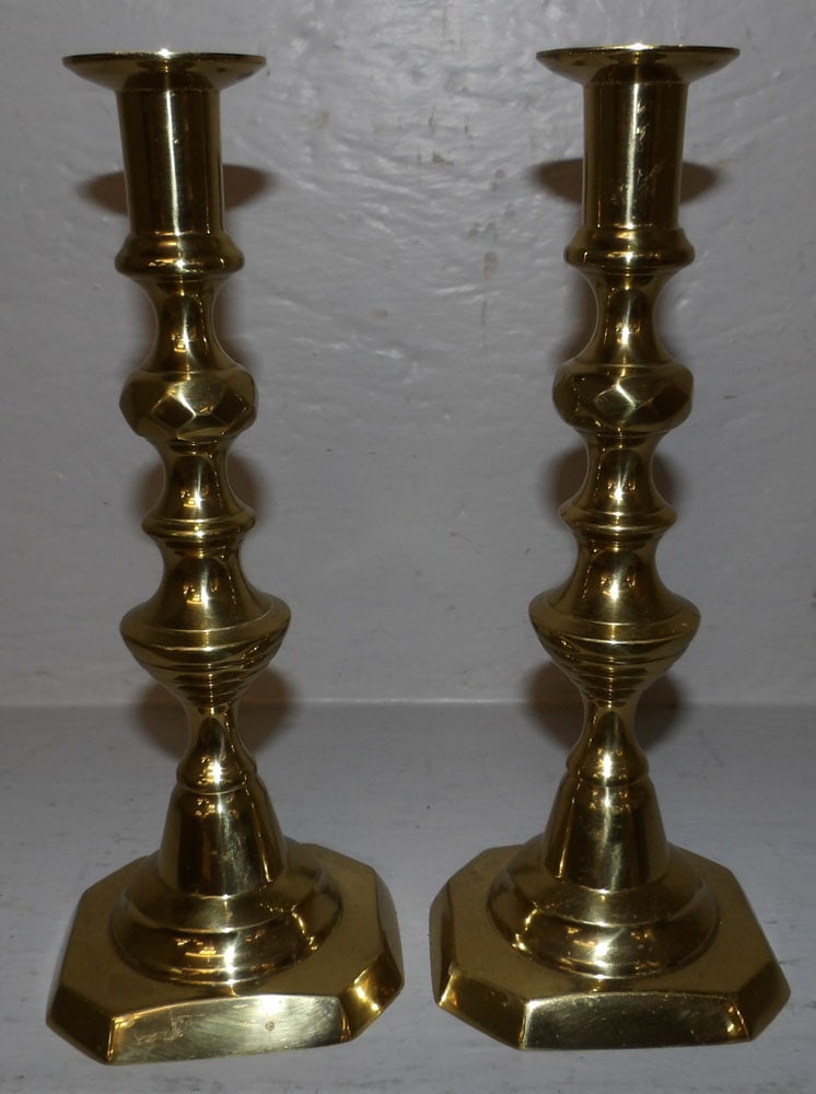 Pair of Brass Candlesticks by Harvin Newport: Pair of Brass Candlesticks by Harvin Newport. 9 3/4" H 3 1/2" Dia.