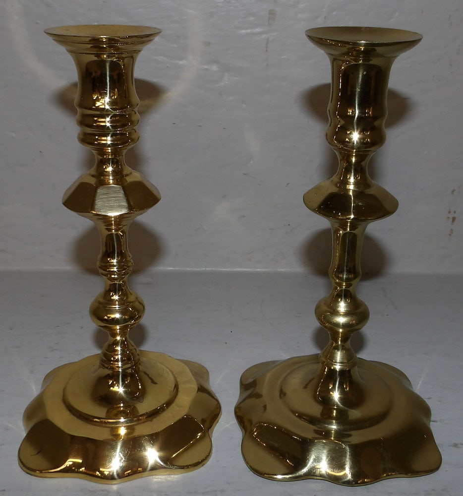 Pair of Brass Candlesticks by Harvin: Pair of Brass Candlesticks by Harvin . 7 1/2" H 4 1/2" Dia.