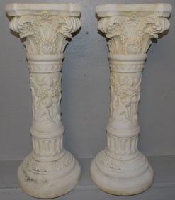 Pair of Ceramic Pedestals with Cherub Motif