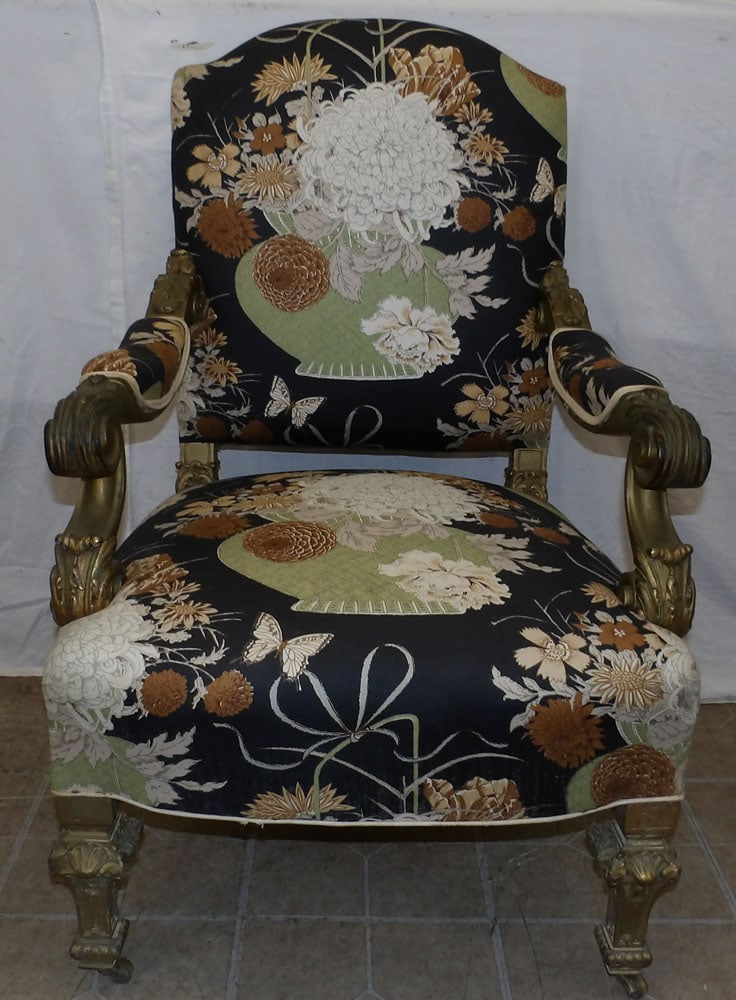 Antique Gilded Carved Wood & Upholstered Arm Chair with Brass Casters: Antique Gilded Carved Wood & Upholstered Arm Chair with Brass Casters . 40 1/2" H 25 1/2" W 27" D