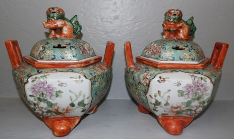 Pair of Painted Oriental Porcelain Covered Urns with Foo Dog Finials