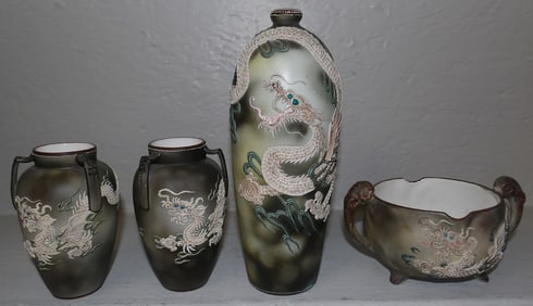 Four Oriental Dragon Motif Vases