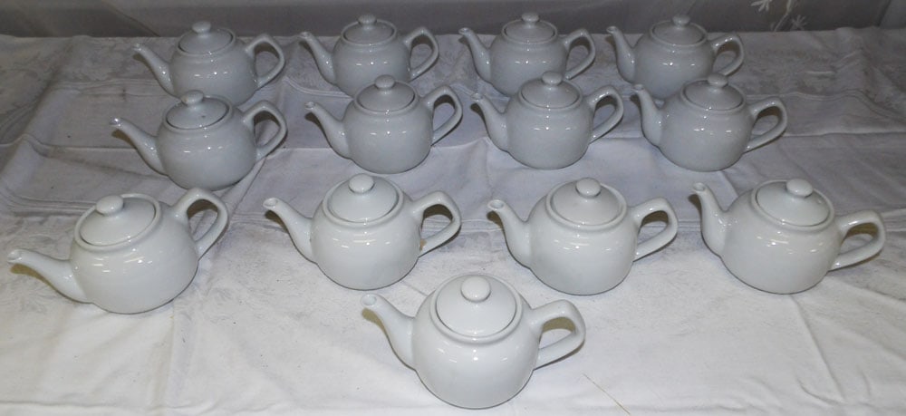 Lot Porcelain Tea Pots & Honey Jars: Lot Porcelain Tea Pots & Honey Jars. Up to 3 1/2" H 4" W 3" D ALL DESCRIPTIONS AND ANY CONDITION STATEMENT GIVEN BY LANGSTON AUCTION GALLERY ARE STRICTLY OPINIONS AND LANGSTON'S SHALL HAVE NO RESPONSI