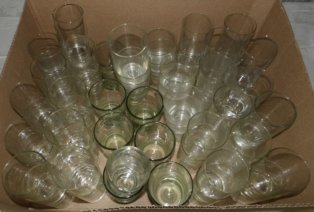 Lot of Cocktail & Highball Glasses: Lot of Cocktail & Highball Glasses. Up to 8” H 3” W 2” D ALL DESCRIPTIONS AND ANY CONDITION STATEMENT GIVEN BY LANGSTON AUCTION GALLERY ARE STRICTLY OPINIONS AND LANGSTON'S SHALL HAV