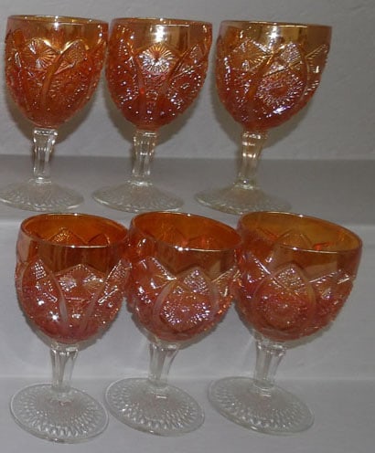 Lot 6 Carnival Glass Marigold Glasses: Lot 6 Carnival Glass Marigold Glasses. 6 1/4" H 3 1/2" Dia. ALL DESCRIPTIONS AND ANY CONDITION STATEMENT GIVEN BY LANGSTON AUCTION GALLERY ARE STRICTLY OPINIONS AND LANGSTON'S SHALL HAVE NO RESPONSIBI