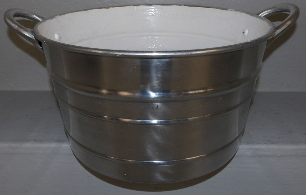 Aluminum Two Handle Wine Cooler: Aluminum Two Handle Wine Cooler . 8 1/2" H 18 1/4" W ALL DESCRIPTIONS AND ANY CONDITION STATEMENT GIVEN BY LANGSTON AUCTION GALLERY ARE STRICTLY OPINIONS AND LANGSTON'S SHALL HAVE NO RESPONSIBILITY FO