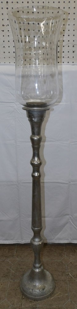 Cast Aluminum Floor Candlestick with Glass Shade: Cast Aluminum Floor Candlestick with Glass Shade . 48 3/4" H 8 1/4" Dia. ALL DESCRIPTIONS AND ANY CONDITION STATEMENT GIVEN BY LANGSTON AUCTION GALLERY ARE STRICTLY OPINIONS AND LANGSTON'S SHALL HAVE