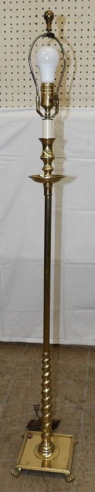 Brass Floor Lamp: Brass Floor Lamp. 50" H 7 1/2" Dia. ALL DESCRIPTIONS AND ANY CONDITION STATEMENT GIVEN BY LANGSTON AUCTION GALLERY ARE STRICTLY OPINIONS AND LANGSTON'S SHALL HAVE NO RESPONSIBILITY FOR ERRORS OR OMISS
