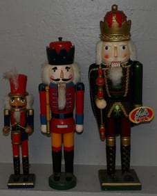 Three Painted Wood Nut Crackers