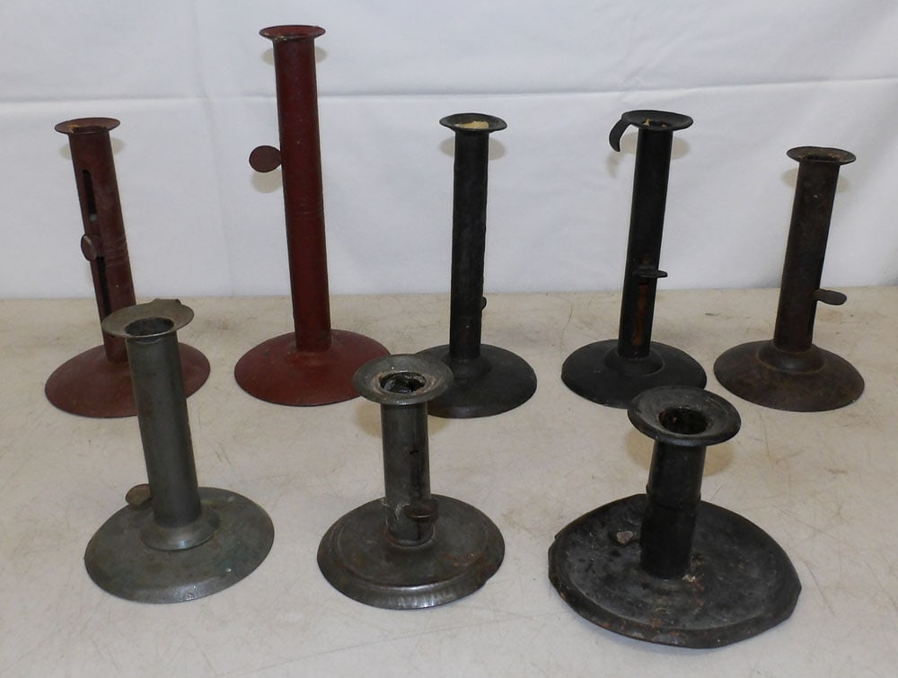 Antique Tole Push Up Candlesticks: Antique Tole Push Up Candlesticks. 9" H 4 1/4" Dia. ALL DESCRIPTIONS AND ANY CONDITION STATEMENT GIVEN BY LANGSTON AUCTION GALLERY ARE STRICTLY OPINIONS AND LANGSTON'S SHALL HAVE NO RESPONSIBILITY FOR