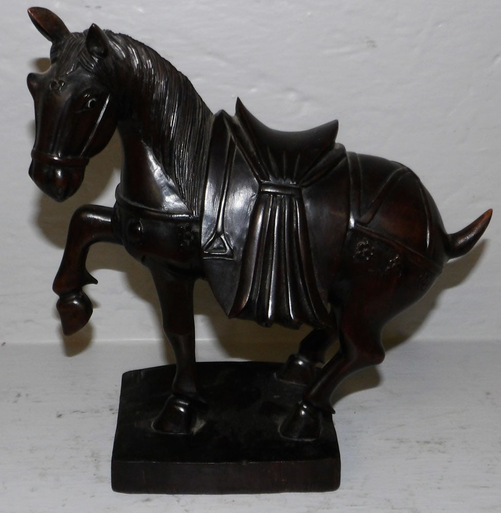 Oriental Carved Teak Wood Horse: Oriental Carved Teak Wood Horse. 8 1/2" H 8 1/2" Dia. ALL DESCRIPTIONS AND ANY CONDITION STATEMENT GIVEN BY LANGSTON AUCTION GALLERY ARE STRICTLY OPINIONS AND LANGSTON'S SHALL HAVE NO RESPONSIBILITY F
