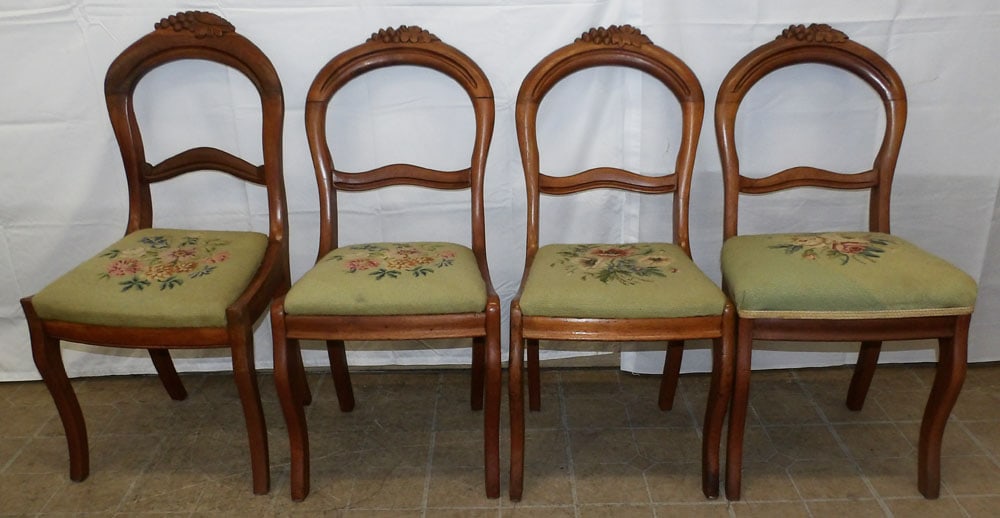 Set of Four Antique Walnut & Needlepoint Seat Dining Chairs: Set of Four Antique Walnut & Needlepoint Seat Dining Chairs . 34 3/4" H 17 1/2" W 17" D ALL DESCRIPTIONS AND ANY CONDITION STATEMENT GIVEN BY LANGSTON AUCTION GALLERY ARE STRICTLY OPINIONS AND LANGSTO
