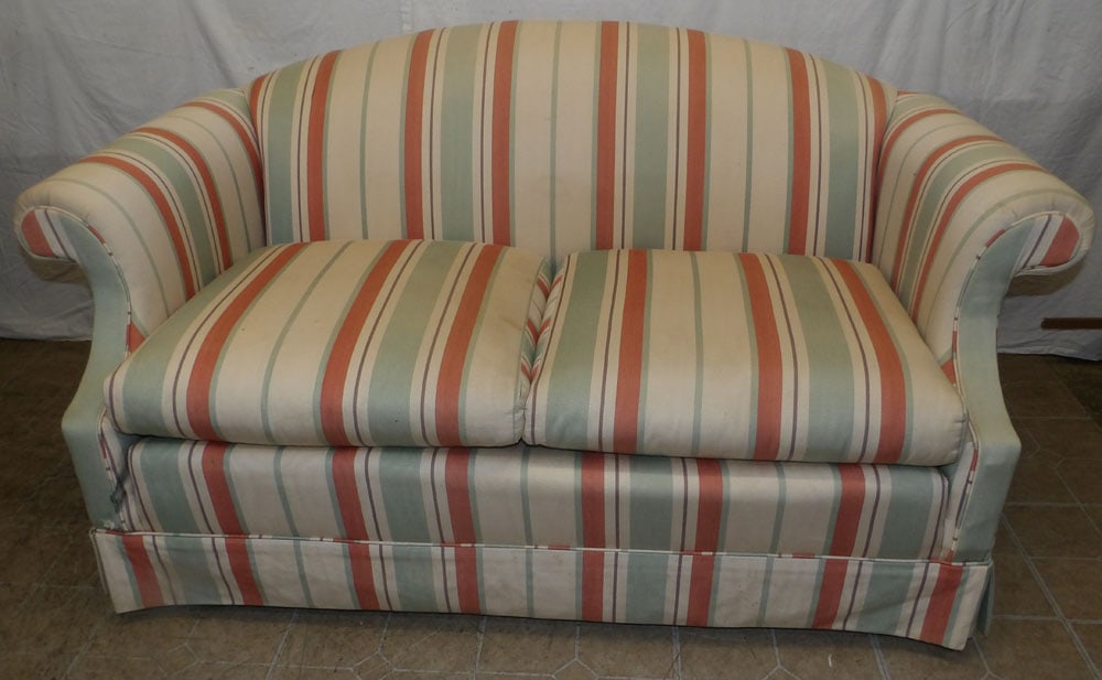 Upholstered Loveseat: Upholstered Loveseat. 31" H 62" W 36" D ALL DESCRIPTIONS AND ANY CONDITION STATEMENT GIVEN BY LANGSTON AUCTION GALLERY ARE STRICTLY OPINIONS AND LANGSTON'S SHALL HAVE NO RESPONSIBILITY FOR ERRORS OR O